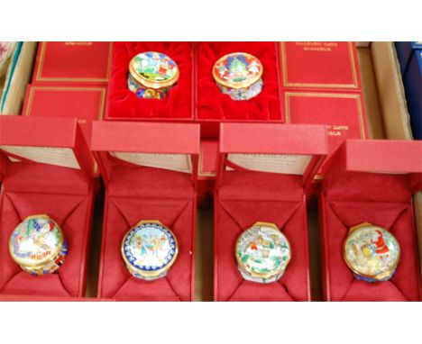 A collection of 17 boxed Halcyon Days Bilston enamel patch boxes to include Christmas boxes etc 