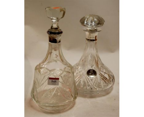 An Elizabeth II silver jubilee cut glass decanter and stopper, having silver collar; together with one other (2)