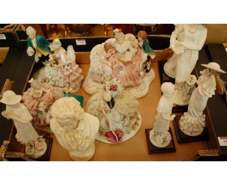 A Capo di Monte style figure group of children reading together with various other continental figures, portrait bust of Beet