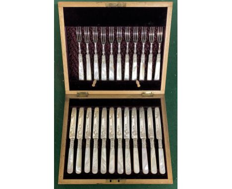 A silver plated and mother of pearl canteen of fruit knives and forks for twelve place settings (one fork missing)