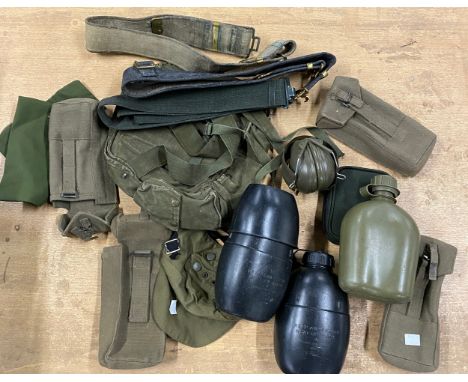 A mixed lot of army surplus items to include water flasks; ear defenders; belts; face mask etc
