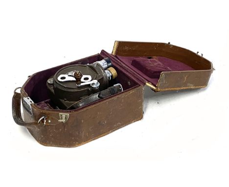 A vintage Bell & Howell Filmo 70DL 16mm film cine camera, in original caseProvenance: The estate of the late Doug Palmer, of 