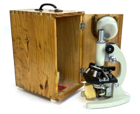A vintage Chinese microscope in wooden caseProvenance: The estate of the late Doug Palmer, of D. Palmer, Postcards and Camera
