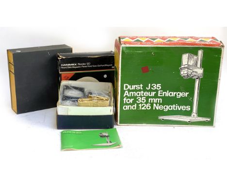 A Durst J35 Amateur Enlarger for 35mm and 126 negatives; Durst M601 manual; together with Hanimax and Kodak slide magazinesPr
