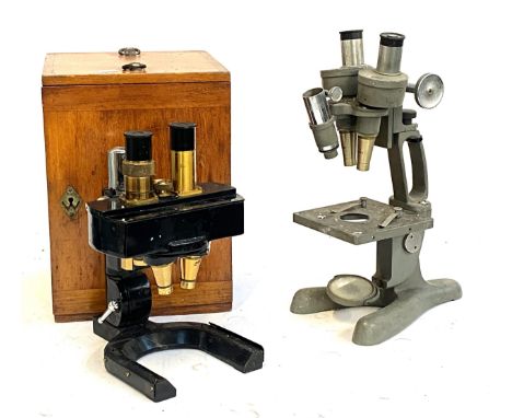 A W. Watson & Sons Ltd binocular microscope, in wooden case; together with a vintage Beck binocular microscope (2)Provenance: