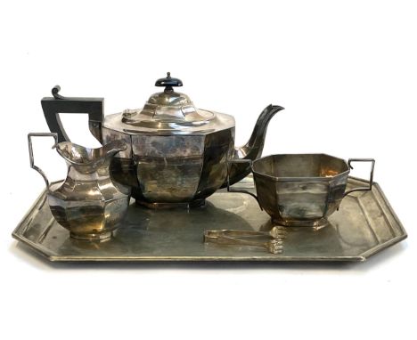 A three piece silver plated tea set, with tray
