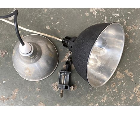 A vintage spun aluminium spotlight, 18cmW; together with a black painted spotlight on clamp, 22cmW (2)