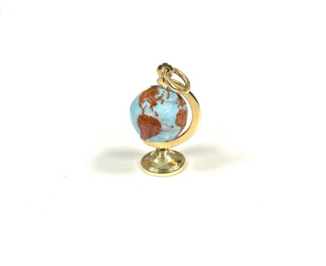A vintage 14ct gold and glass charm in the form of a desk globe, 1.9cmL, 2.1g