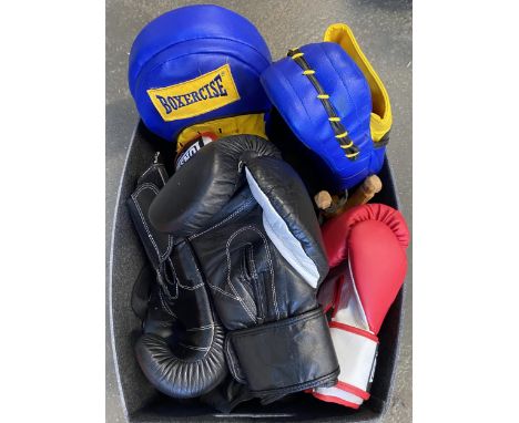 A lot of various boxing gloves and pads, to include Lonsdale