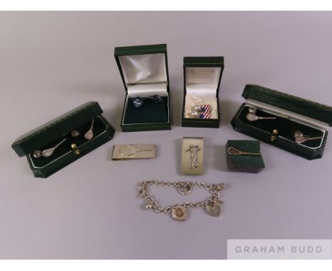 A selection of silver tennis, golf and American baseball money clips, cuff-links and bracelet, comprising a silver tennis mon