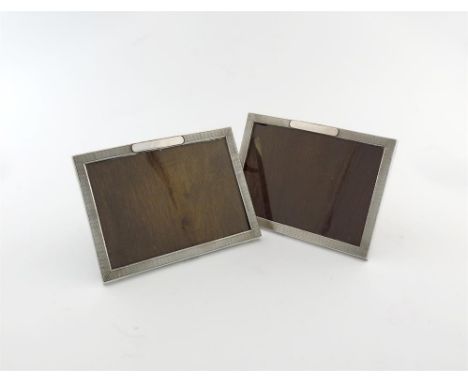 A pair of Victorian silver photograph frames, by J. Vickery, London 1892, rectangular form, engine-turned decoration, the fro