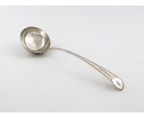 A George III silver Bright-cut pattern soup ladle,  by John Lambe, London 1780, the terminal with an initial, circular bowl, 