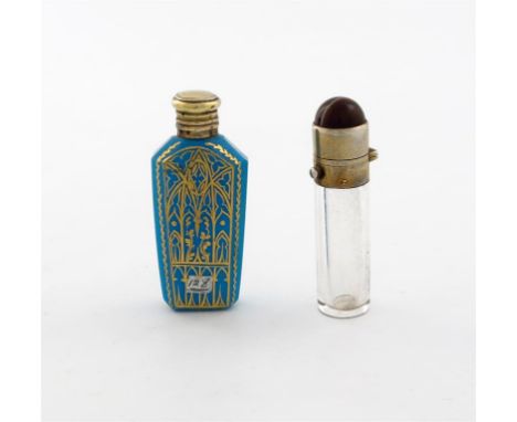 A French silver-gilt mounted tiger's eye hard stone scent bottle, plain cylindrical form, the plain hinged cover with a push 