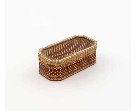 λ A late 18th century vari-coloured gold-mounted blond tortoiseshell snuff box, maker's mark of C.B, rectangular form, canted