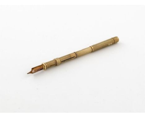 A late Victorian 9 carat gold extending pen and propelling pencil, by S. Mordan, engine turned decoration, slide out pen, and