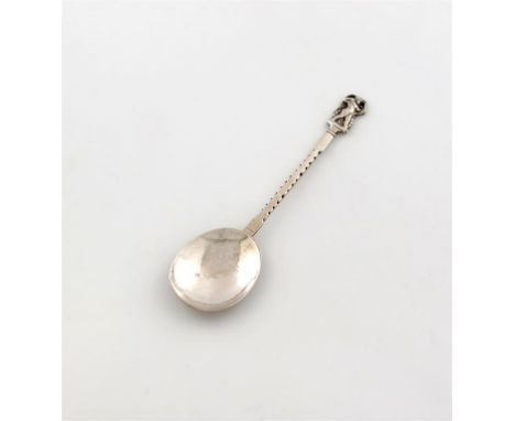 By John Paul Cooper, an Arts and Crafts silver spoon, London 1922, oval bowl, spot-hammered decoration, the finial modelled a
