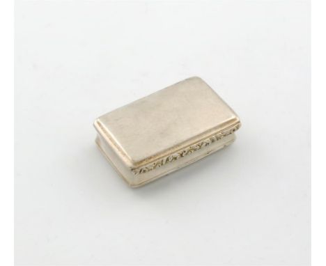 A George IV Scottish silver snuff box,  maker's mark of A.W, Edinburgh 1823, plain rectangular form, with a foliate thumb-pie