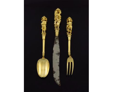 A fine and unusual George IV silver-gilt knife, fork and spoon set, by William Eley II, London 1825, the terminals with heavy