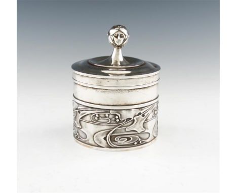 An Edwardian Art Nouveau silver box, by G L Connell Ltd, London 1902, cylindrical form, embossed with swirling foliate decora