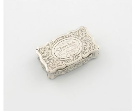 A Victorian presentation silver snuff box, by Hilliard and Thomason, Birmingham 1856, rectangular form, engraved foliate scro