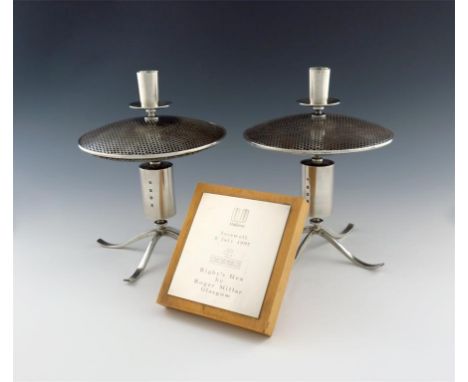 By Roger Miller, a pair of modern Scottish silver and mixed metal candlesticks, Edinburgh 1997, cylindrical stem, supporting 
