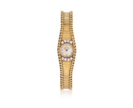JAEGER LECOULTRE A LADY'S 18 CARAT GOLD AND DIAMOND BRACELET WATCH, 850281A, CIRCA 1967Movement: Cal. 450, manual wind  Case: