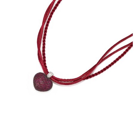 WEMPE, A RUBY AND DIAMOND SET HEART PENDANT The bombé heart pavé set with circular cut rubies, to a pavé set brilliant cut di