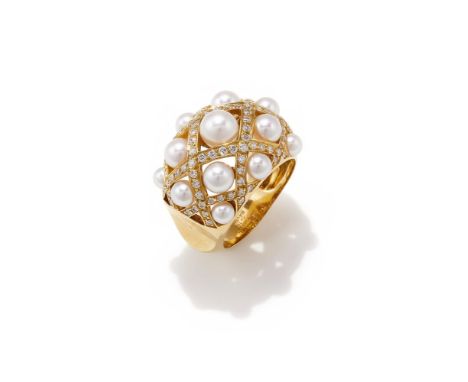 LORENZ BAUMER FOR CHANEL, A DIAMOND AND CULTURED PEARL 'PERLES MATELASSE' RING  Designed as a latticework of brilliant cut di