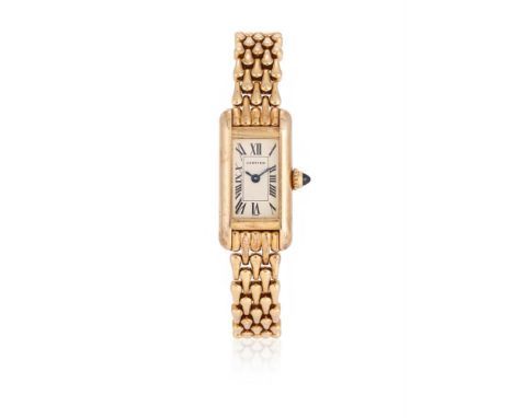 CARTIER, TANK MINI AMERICAINE, REF. 1380 A LADY'S 18 CARAT GOLD BRACELET WATCH, NO. C90832, CIRCA 1990Movement: Cal. 28 ETA. 