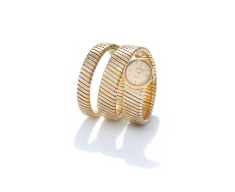 Ω&nbspBULGARI AND JAEGER-LECOULTRE, A TRICOLOURED 'TUBOGAS SERPENTI' BRACELET WATCH  CIRCA 1970S The tapered tricoloured flex