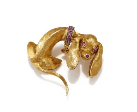 A RUBY SET NOVELTY BROOCH Modelled as a dachshund with circular cut ruby eyes, nose and collar, stamped 750 18K Size/dimensio