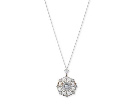 AN EDWARDIAN PEARL AND DIAMOND PENDANT/BROOCH CIRCA 1900 The old European cut diamond cluster within an openwork surround set