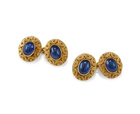 DEAKIN & FRANCIS, A PAIR OF SAPPHIRE CUFFLINKS CIRCA 1990 Each oval terminal collet set with a cabochon sapphire within an 18