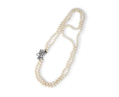 A TWO STRAND CULTURED PEARL AND DIAMOND NECKLACE  Composed of two graduated strands of 6.2 to 9.3mm cultured pearls, to a sin