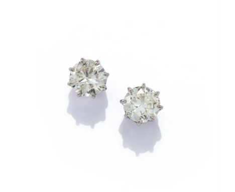 A PAIR OF DIAMOND SINGLE STONE EARRINGS Each brilliant cut diamond in an eight claw mount, post fittings, diamonds weighing a
