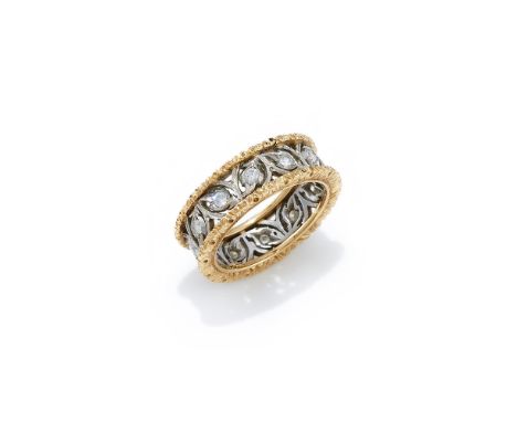 BUCCELLATI, A DIAMOND BAND RING Of bicoloured design, formed as a continuous foliate lattice, accented by brilliant cut diamo