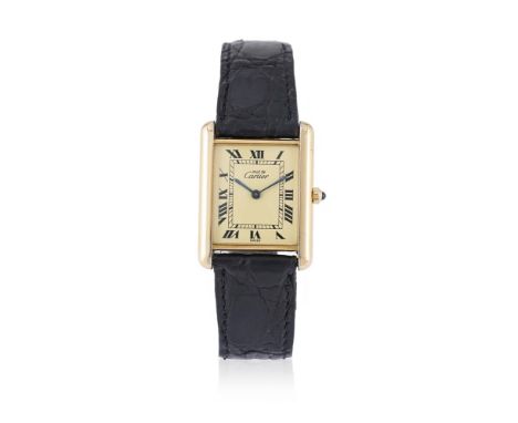 CARTIER, MUST DE CARTIER TANK, REF. 6 81006 A SILVER GILT MID SIZE WRISTWATCH, NO. 82032, CIRCA 1990Movement: Cal. 81, quartz