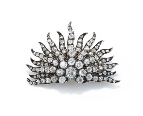 A LATE 19TH CENTURY DIAMOND SUNBURST BROOCH  CIRCA 1890 The central old European cut diamond cluster, within a radiating half