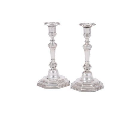 A PAIR OF VICTORIAN SILVER BRITANNIA STANDARD CANDLESTICKS CHARLES STUART HARRIS, LONDON 1893 With shaped circular sconces, o