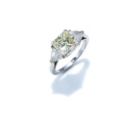 A DIAMOND RING The central squared mixed cut diamond, weighing 3.51 carats, between triangular cut diamond shoulders, the sha
