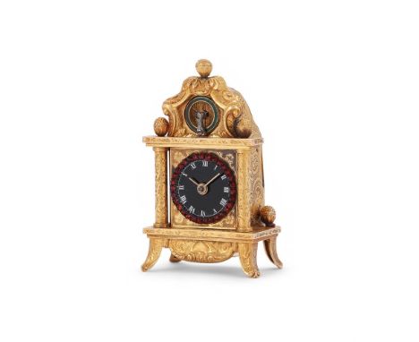 A LATE 19TH CENTURY MINIATURE ZAPPLER STYLE CLOCK  The miniature table clock with a black enamelled dial and white Roman nume