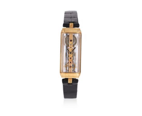 Y&nbspCORUM, GOLDEN BRIDGE  A LADY'S 18 CARAT GOLD AND SAPPHIRE CRYSTAL WRISTWATCH, NO. 2387, CIRCA 1990Movement: Manual wind