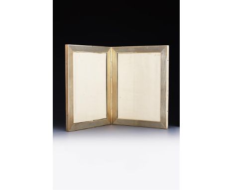 A 9CT GOLD DOUBLE PHOTO FRAME WILMOT MANUFACTURING CO., BIRMINGHAM, 1929 The two rectangular frames with engine turned decora