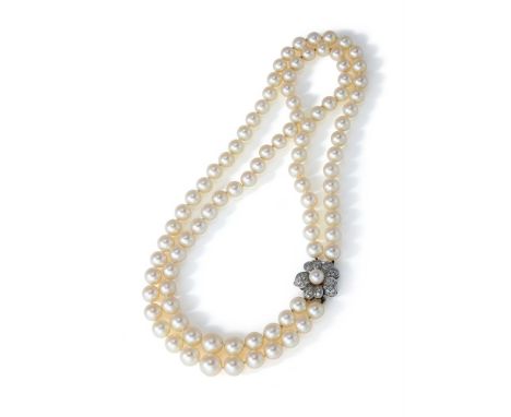 A TWO ROW CULTURED PEARL NECKLACE Composed of two strands of graduated 6.9 to 9.9mm cultured pearls to a cultured pearl and s