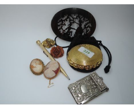 A small selection of misc items including a gold plated Kigu powder compact, gold plated propelling pencil, silver plated aid