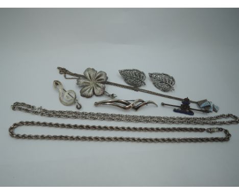 A selection of silver and white metal jewellery including two HM silver rope chains, an enamelled pendant on an Italian silve