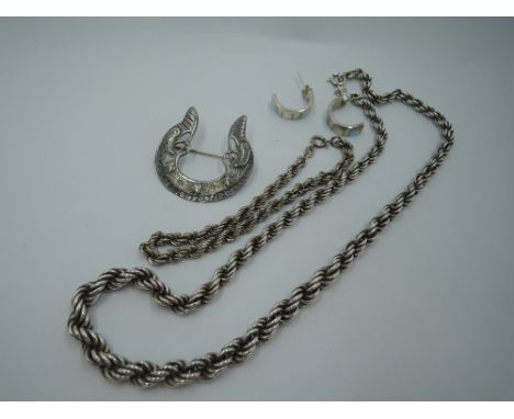 A silver graduated rope chain with matched bracelet, a pair of half hoop stud earrings having mother of pearl decoration and 