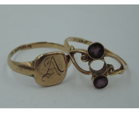 A 9ct rose gold signet ring monogrammed A, and a 9ct gold dress ring having two pink paste gems, (missing central stone) in a