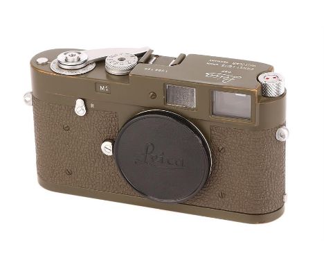 A Leica M1 Bundeseigentum Body,1964, olive, serial no. 1098126, body, G-VG, shutter working; Military model engraved 'Bundese