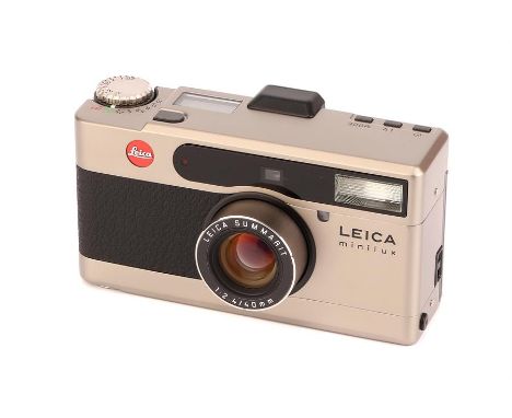 A Leica Minilux Compact Camera,titanium, serial no. 2071903, with Leitz Summarit f/2.4 40mm lens, body, E, untested, lens, E,